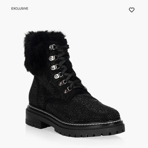 Black ankle height boots with subtle studded detail.